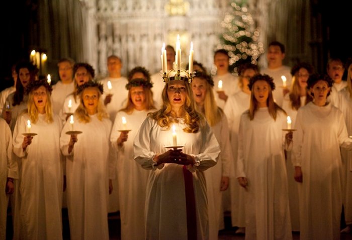this is a photo of a saint lucy's day celebration in sweden for the holidays