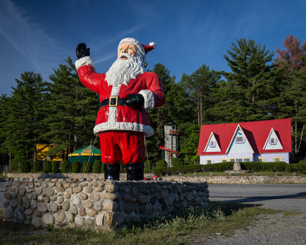 this is a photo of a santa claus statue celebrating the christmas holidays