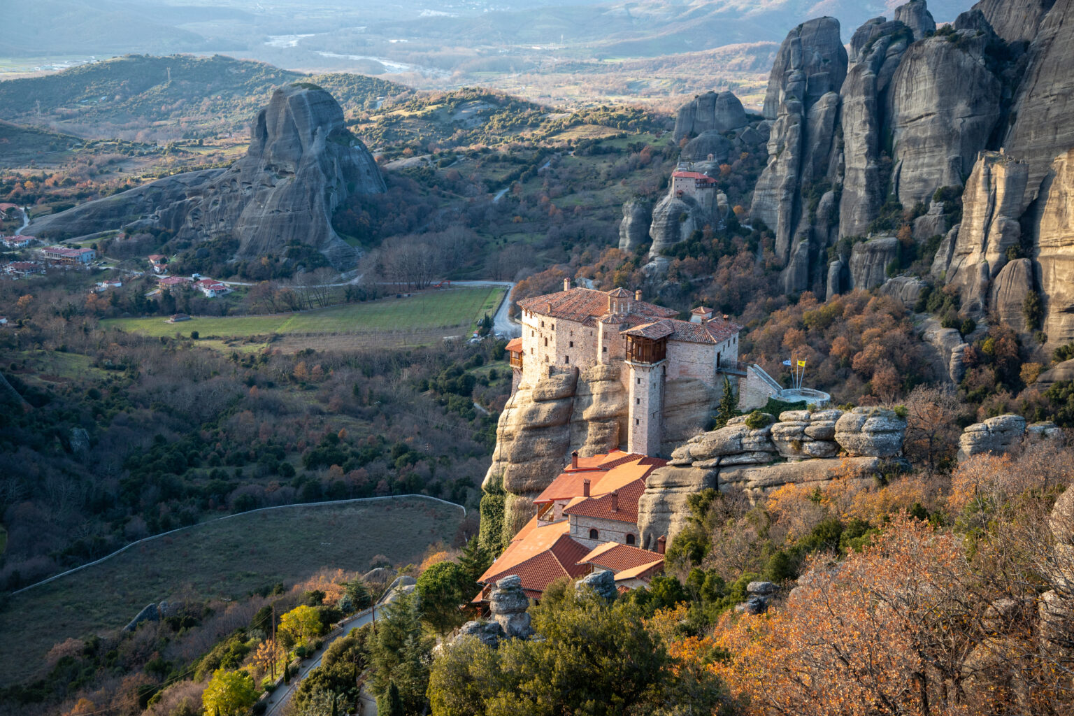 The Monasteries of Meteora an UNESCO World Heritage at sunset. The Holy Monastery of Roussanou. Kalambaka (Kalabaka), Greece.