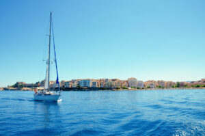 sailboat off the coast of the island of corfu in greece