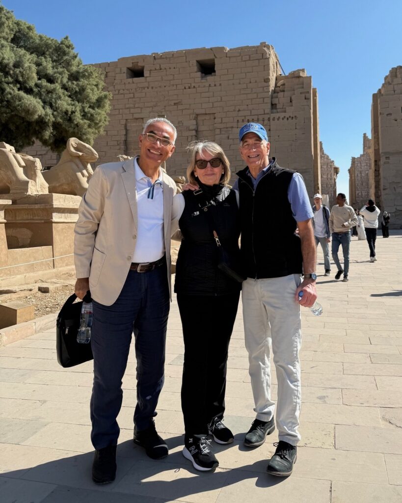 Bruce (right) with wife Becky and longtime colleague Mahmoud in Luxor, Egypt