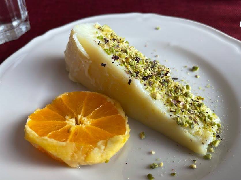 Dessert at the farm: Gelo di Arancia, a delicate fruit pudding topped with chopped local pistachios 
