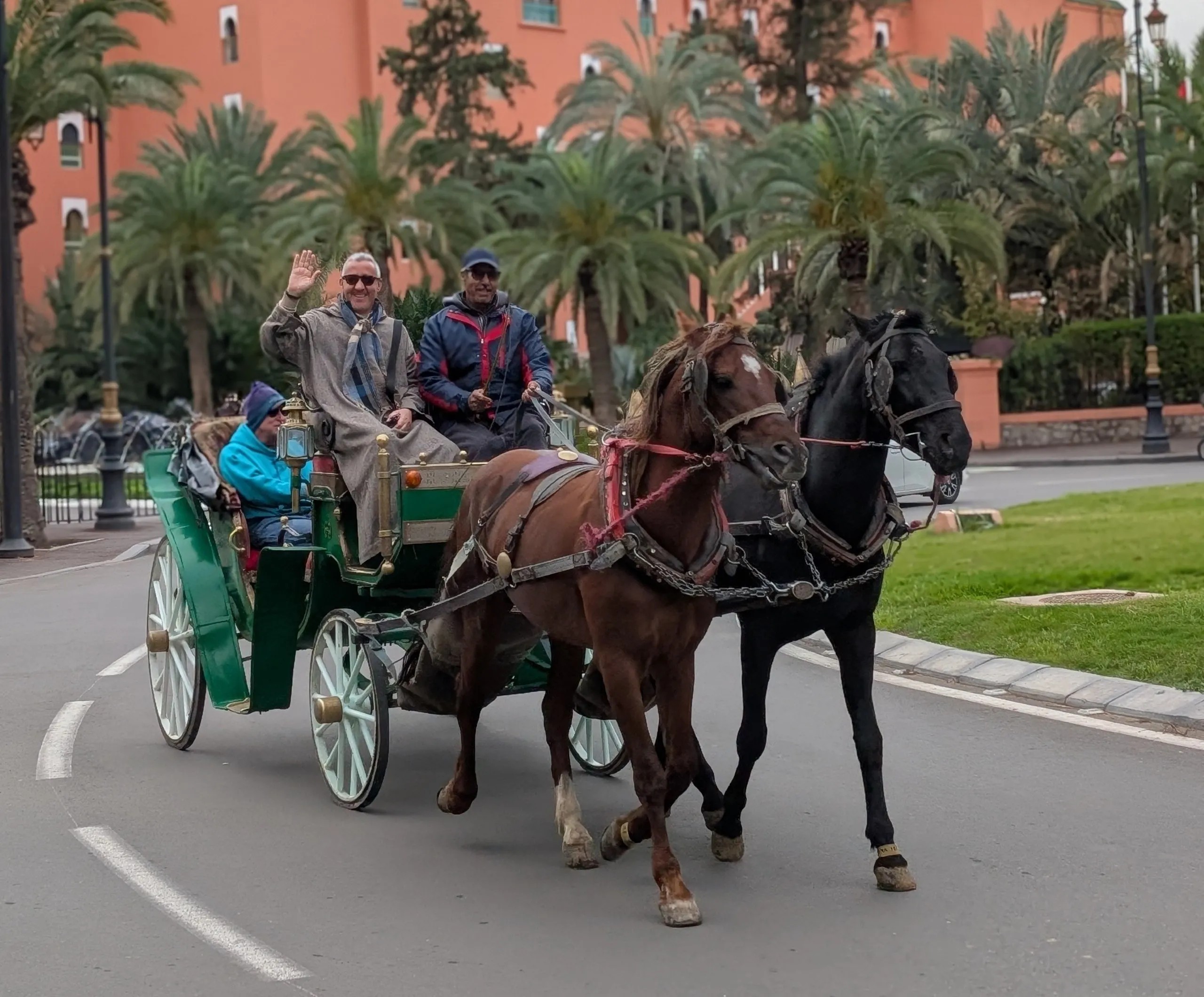 Odysseys guests enjoy a horse-drawn carriage ride through Marrakech. Photo: Joie G.