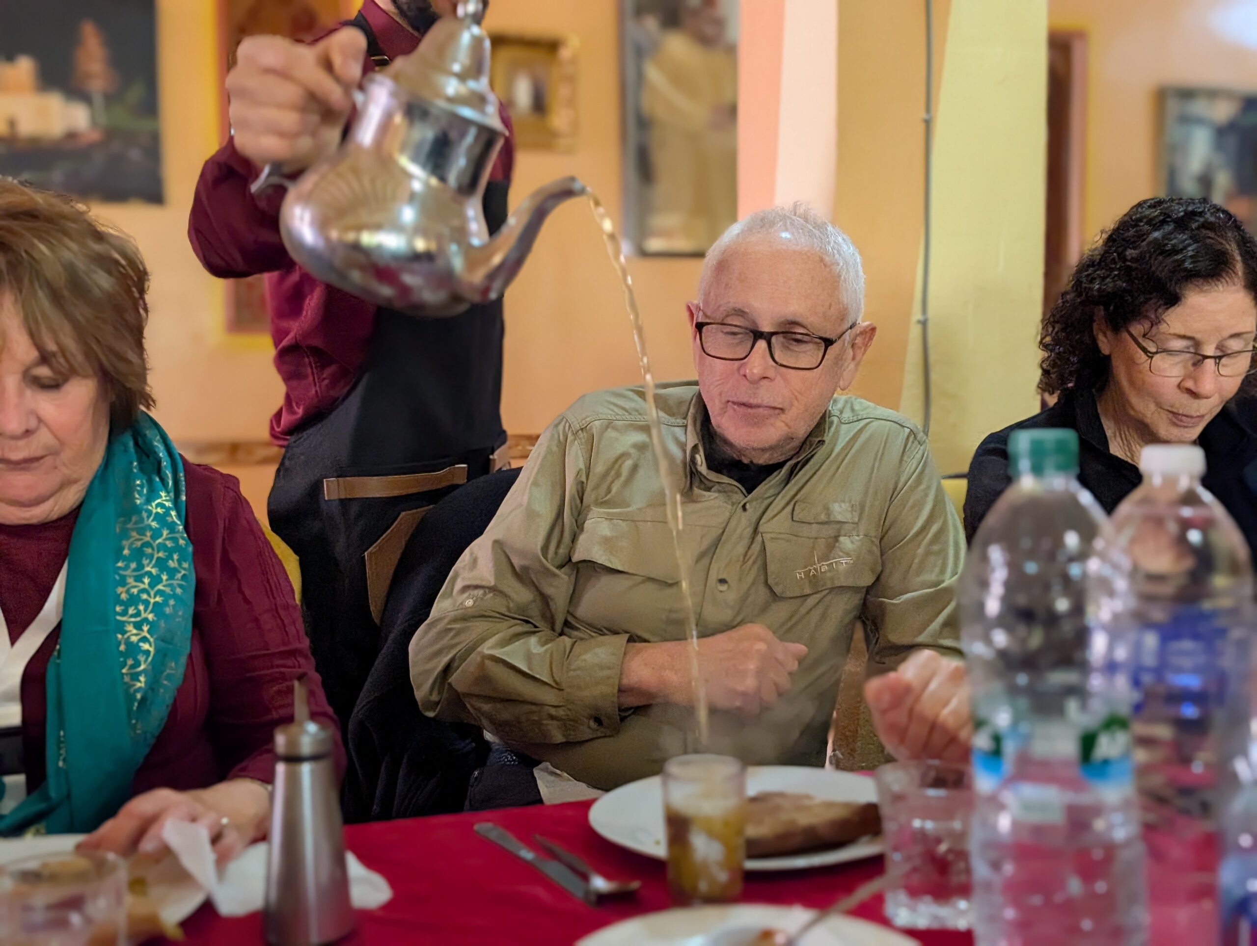 Receiving a pour of Morocco’s beloved mint tea, served across the country as a gesture of welcome. Photo: Joie G.