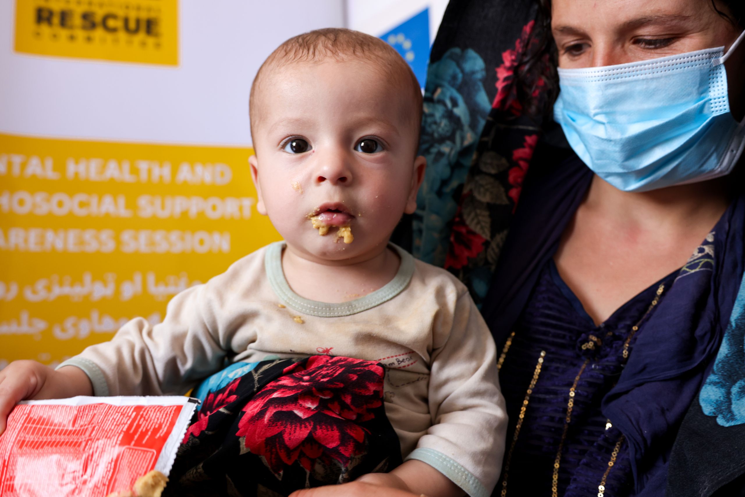 Afghanistan: Sahil’s mother Afsana feeds him RUTF (Ready-to-Use Therapeutic Food) nutritional supplements that she received as part of his treatment for malnutrition. © International Rescue Committee Photo: Abdul Khaliq Sediqi for the IRC